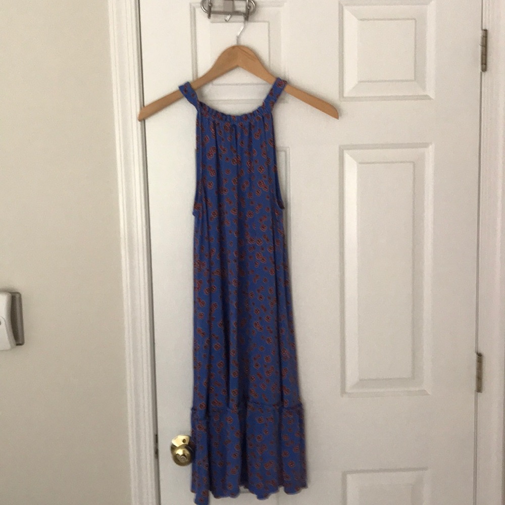 Blue flowered sleeveless dress.